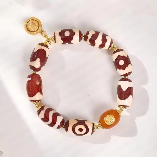 Hand-carved red agate Dzi bead bracelet, a masterpiece of Buddhist sacrificial items art rooted in the authentic Tibetan Buddhist sacrificial implements culture.