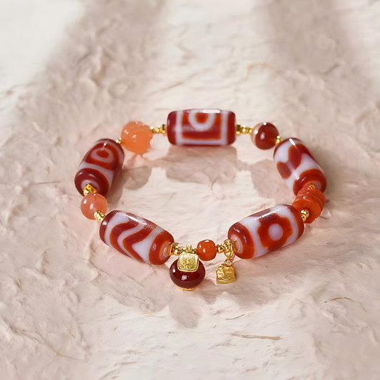 Tibetan Buddhist sacrificial implements culture red meat agate bucket Dzi multi-pattern bracelet. Handcrafted from natural agate as a piece of Buddhist sacrificial items art.