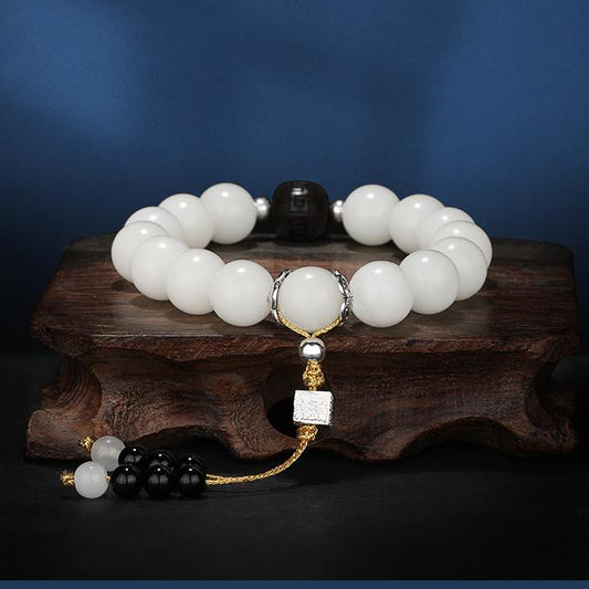 Enlightenment Wood Mala combining white bodhi root with carved wood beads. This jewelry culture represents authentic Tibetan Buddhist meditation practices.