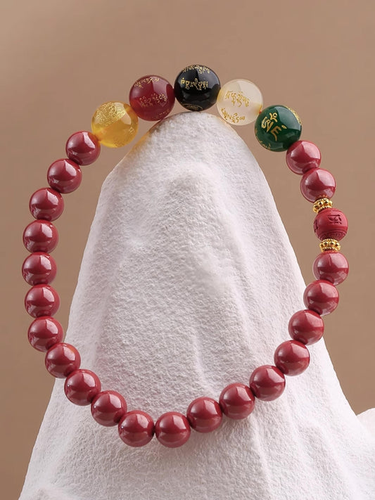 Cinnabar Protection Bracelet featuring pure handcrafted cinnabar and agate beads. This Tibetan Buddhist jewelry art offers energetic shielding and spiritual safeguarding.