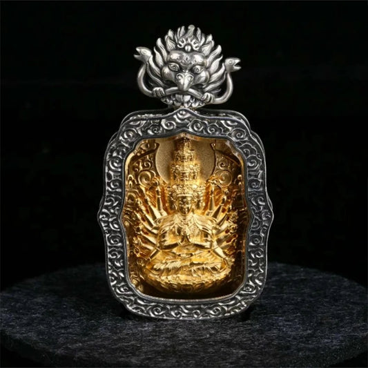 Hand-carved silver Yellow Jambhala pendant inspired by Tibetan Buddhist jewelry culture, symbolizing wealth and protection.