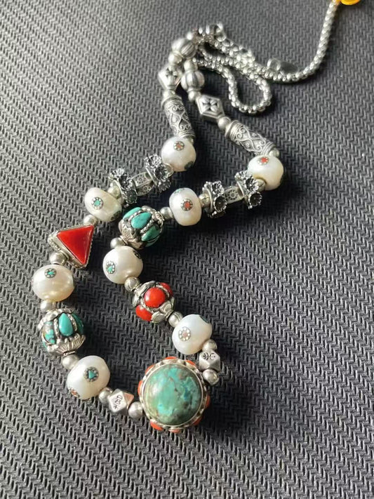 combining rich Tibetan Buddhist art with precious multi-treasure inlays. Ideal for fashion lovers and spiritual seekers looking for elegant, meaningful jewelry.