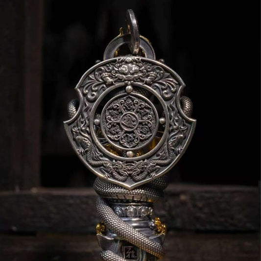 Handmade Snake King guardian pendant from Tibetan Buddhist jewelry culture, sacred jewelry art for protection and meditation.