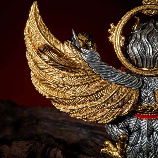 Hand-painted Tibetan Garuda silver pendant, a sacred jewelry art piece representing courage and obstacle removal.