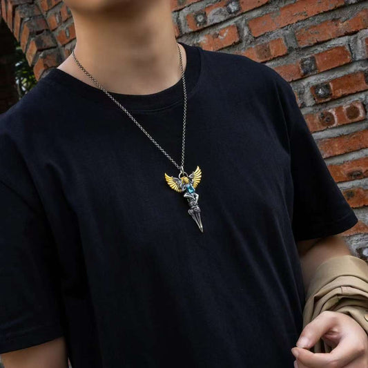 Handmade silver Garuda phurba vajra pendant from Tibetan Buddhist jewelry culture, powerful spiritual jewelry art.