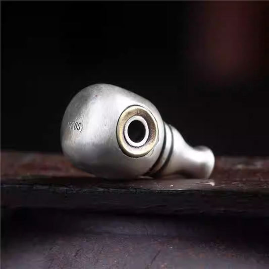 Handcrafted Tibetan Buddhist jewelry accessory featuring a sterling silver Buddha head three-connector with copper inlay, smooth minimalist design for DIY prayer bead bracelets