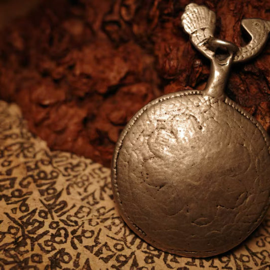 Hand-painted Peacock Wisdom King nine palace bagua pendant inspired by Tibetan Buddhist jewelry culture, symbolizing protection and harmony.