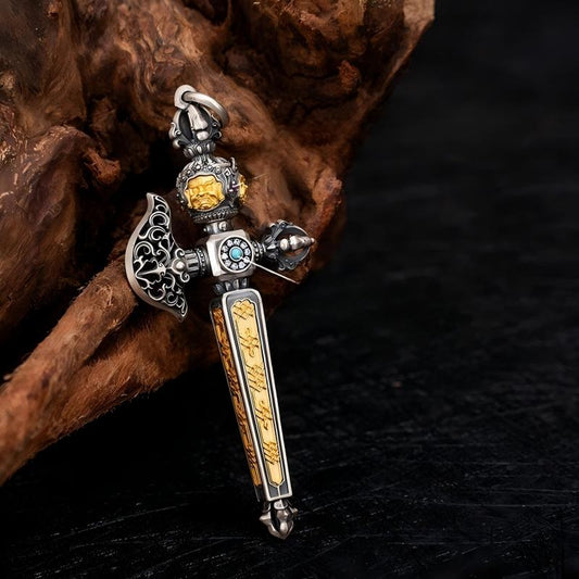 Handcrafted silver rotating Mahakala axe pendant inspired by Tibetan Buddhist jewelry culture, powerful jewelry art symbolizing protection and strength.