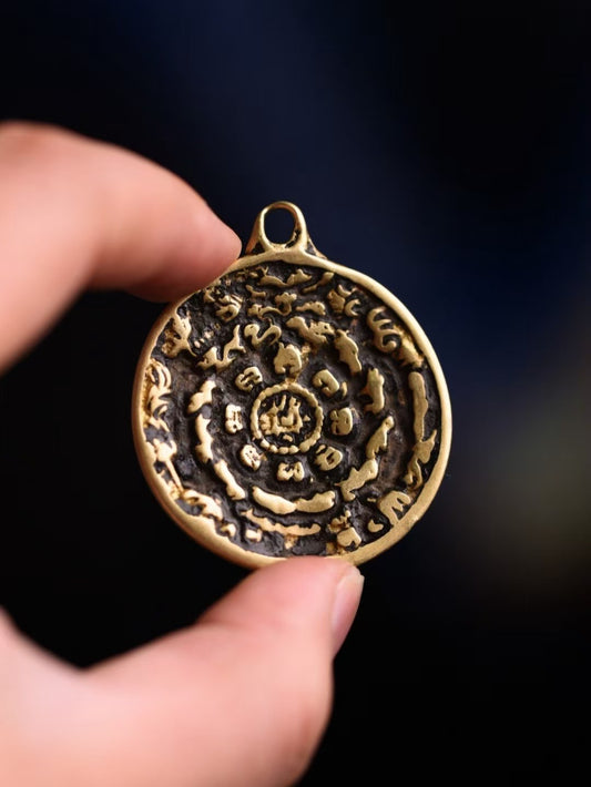 Qing Dynasty style Tibetan Bagua amulet pendant, handcrafted jewelry art for harmony and protection.