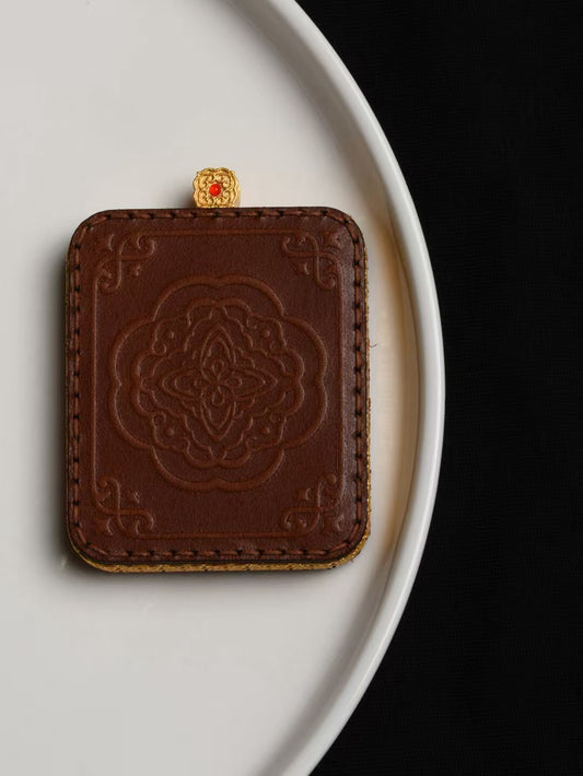 Tibetan Blue and Yellow Jambhala Thangka amulet pendant, handmade Jewelry art rooted in Tibetan Buddhist Jewelry Culture