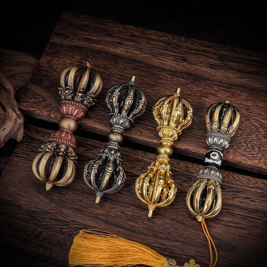 This 13cm handcrafted Nine-Pronged Vajra made of brass and copper serves as both a spiritual tool and a piece of Tibetan Buddhist art. Ideal for deepening your meditation and spiritual practice.