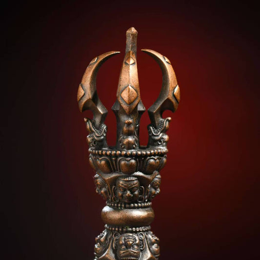 Handcrafted brass Phurba Vajra in Tibetan Buddhist ritual implements culture, symbolizing protection and spiritual power.