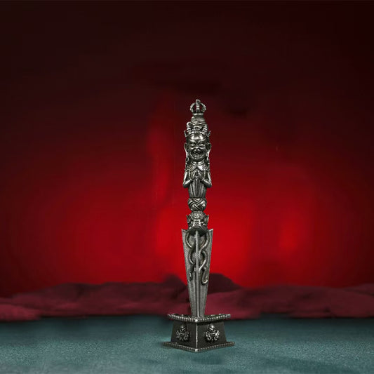 Handcrafted Tibetan Buddhist ritual implements culture vajra phurba made of brass and meteoric iron, symbolizing protection and spiritual power in Buddhist ritual implements art.