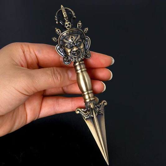 Handcrafted brass Wrathful Vajra from Tibetan Buddhist ritual implements culture, powerful Buddhist ritual implements art symbolizing protection and spiritual strength.