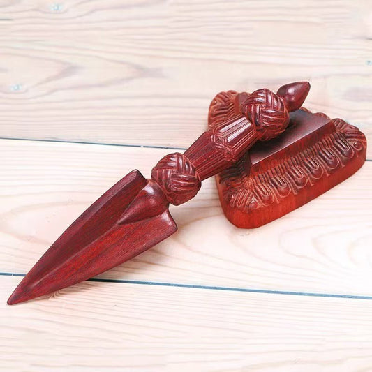 Handcrafted brass and African red sandalwood Vajra with a wooden base, symbolizing spiritual strength and protection. A unique piece of Tibetan Buddhist ritual art, perfect for rituals, meditation, and spiritual decor.