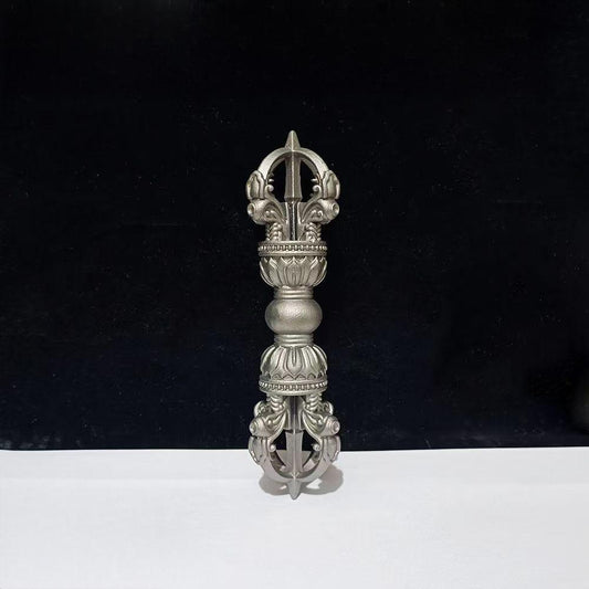 This Five-Pronged Vajra, crafted from brass with meteorite details, embodies the deep cultural and spiritual strength of Tibetan Buddhism. Each piece is meticulously carved, perfect for religious ceremonies, home decor, or as a devotional item for followers, offering positive energy and protection.