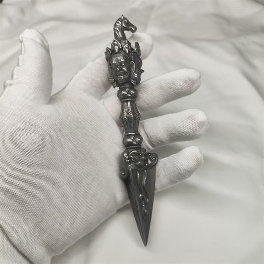 Handcrafted brass three-faced Mahakala Phurba from Tibetan Buddhist ritual implements culture, representing protection, transformation, and sacred Buddhist ritual art.