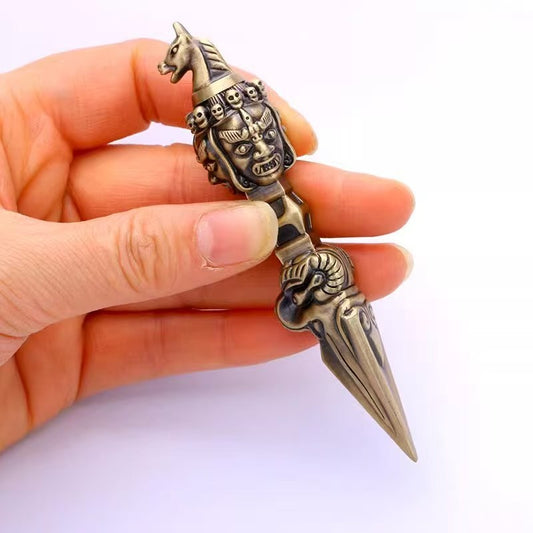 Handcrafted brass Mahakala Vajra, a powerful spiritual tool and sacred art piece. Perfect for enhancing your spiritual practice, protecting your space, and elevating meditation.
