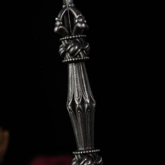 Alt Text: Handcrafted brass Vajra Phurba with iron base, featuring an antique design. Symbolizing spiritual strength and protection, ideal for Tibetan Buddhist rituals and meditation.
