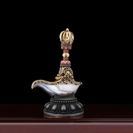 A handcrafted Vajra Axe made from brass, copper, and white copper. This powerful tool symbolizes spiritual strength and purification, making it perfect for Tibetan Buddhist rituals.