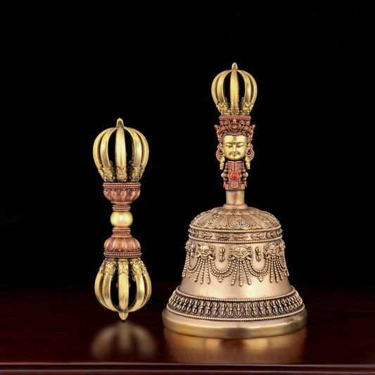 Small handcrafted nine-pronged Vajra bell made from high-quality brass and copper. Adds spiritual clarity and strength to meditation and Tibetan rituals.