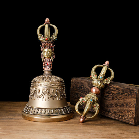 Small handcrafted nine-pronged Vajra bell made from high-quality brass and copper. Enhances meditation practice and provides spiritual protection and insight
