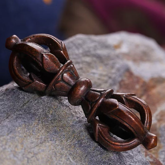 Handcrafted brass five-pronged Vajra Bell (Phurba) inspired by Tibetan Buddhist ritual implements culture, showcasing traditional Buddhist ritual implements art.