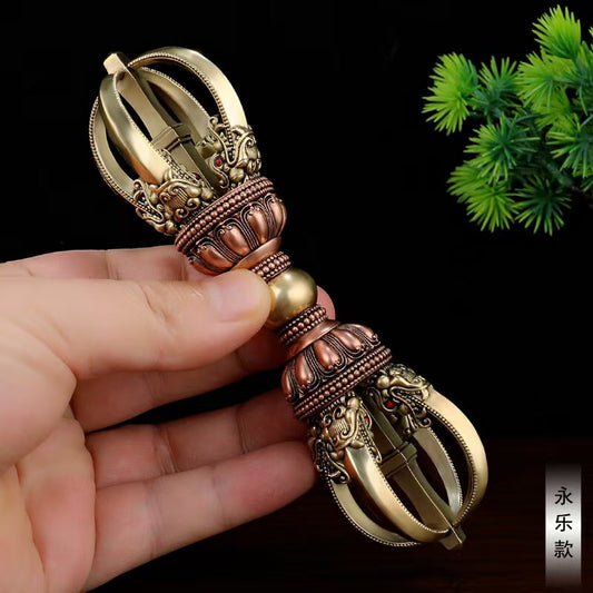 Handmade brass Yongle vajra with purple copper detail, representing Tibetan Buddhist ritual implements culture, used for spiritual protection and enhancing meditation.