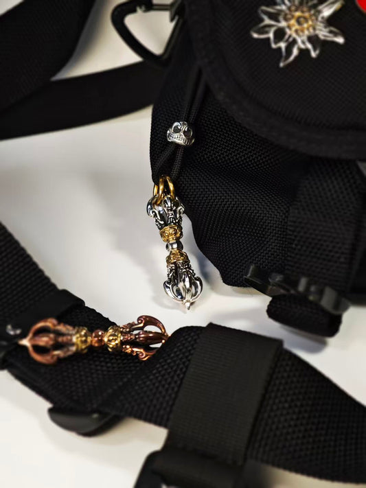 Handcrafted brass phurba vajra, representing Tibetan Buddhist ritual implements culture, enhancing meditation and spiritual protection in Buddhist ritual implements art.