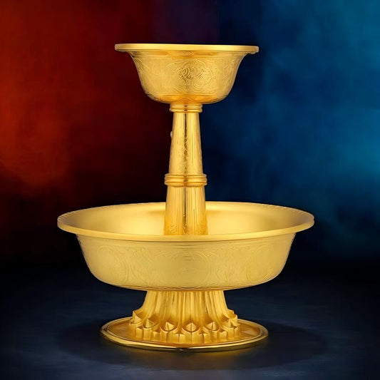 Tibetan Buddhist sacrificial implements culture: A detailed close-up of a hand-engraved sterling silver gilt Dharmapala offering cup, showcasing intricate traditional patterns and Buddhist sacrificial items art.