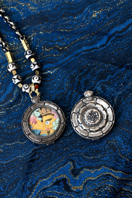 A portable Yellow Jambhala Thangka amulet designed for career growth, attracting wealth, and preventing financial loss.