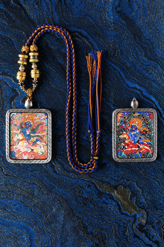 A 4x5cm hand-painted Palden Lhamo Thangka in Miansa style, featuring pure gold powder and mineral pigments in a silver frame.