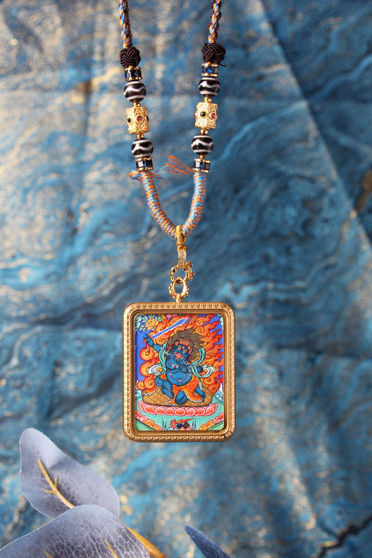 Hand-painted Rebgong Vairocana Buddha Thangka pendant, the supreme solar Buddha in vibrant mineral pigments.