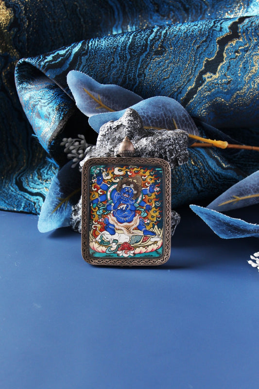 Detailed view of the 925 sterling silver casing with the Nine-Colored Deer motif designed for the Mahakala pendant.