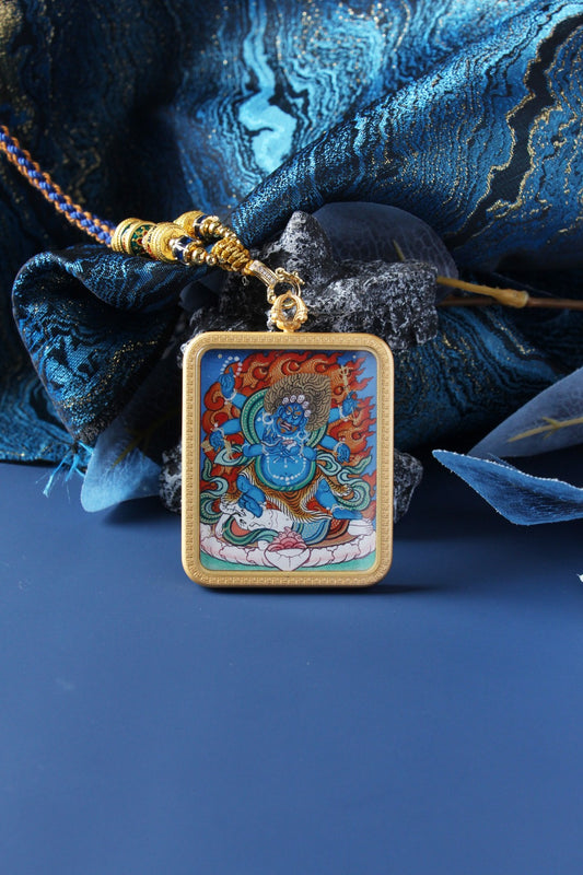 Micro-detail of a Rebgong Mahakala Thangka showing the intense mineral pigment colors and fine linework of the wrathful deity.