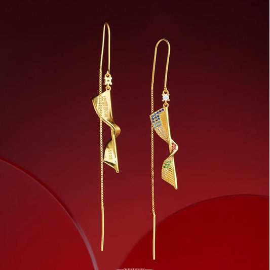 Handmade Tibetan Buddhist 925 silver Ruyi earrings symbolizing harmony and good fortune.