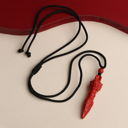 Tibetan Buddhist Qi Tian Le cinnabar Tibetan Buddhist Qi Tian Le cinnabar pendant with handmade craftsmanship.