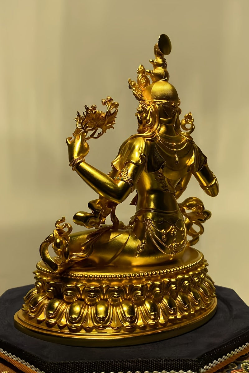 Handcrafted Tibetan-buddhist Vajrapani statue in pure silver gilding, detailed Buddha art with traditional mineral colors.
