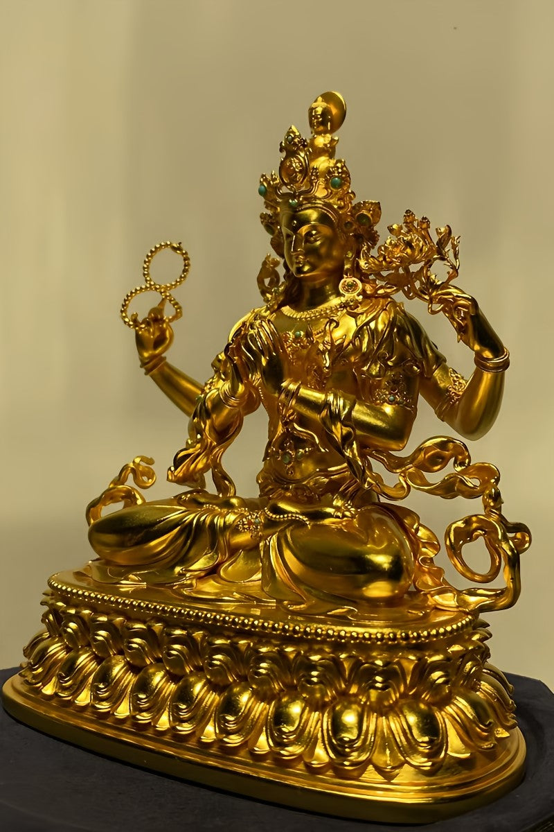 Tibetan-buddhist Vajrapani Bodhisattva statue, serene form in silver and gold gilding, handmade Tibetan Buddha art.
