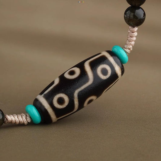 Tibetan Buddhist nine-eye agate pendant with Thangka painting, featuring copper and silver stone elements.