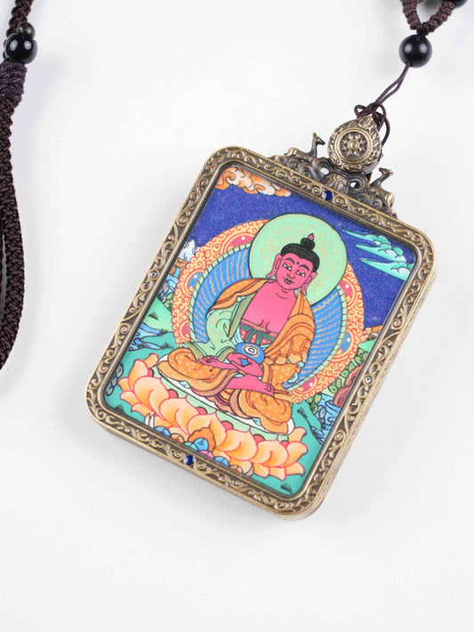 Hand-painted Tibetan Amitabha Thangka pendant symbolizing infinite light and compassion.