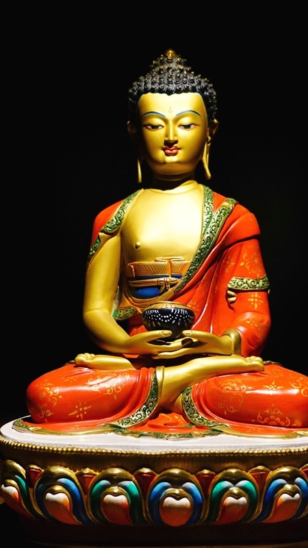 "Handcrafted Tibetan Buddhist Amitabha Buddha statue, gilded with intricate designs and mineral pigments. A representation of compassion and wisdom in Tibetan culture."