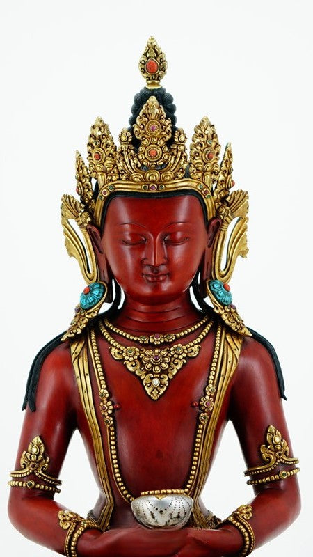 This Amitabha Buddha statue is made from Tibetan copper and intricately hand-painted with mineral colors, reflecting the deep cultural heritage and artistry of Tibetan Buddhism