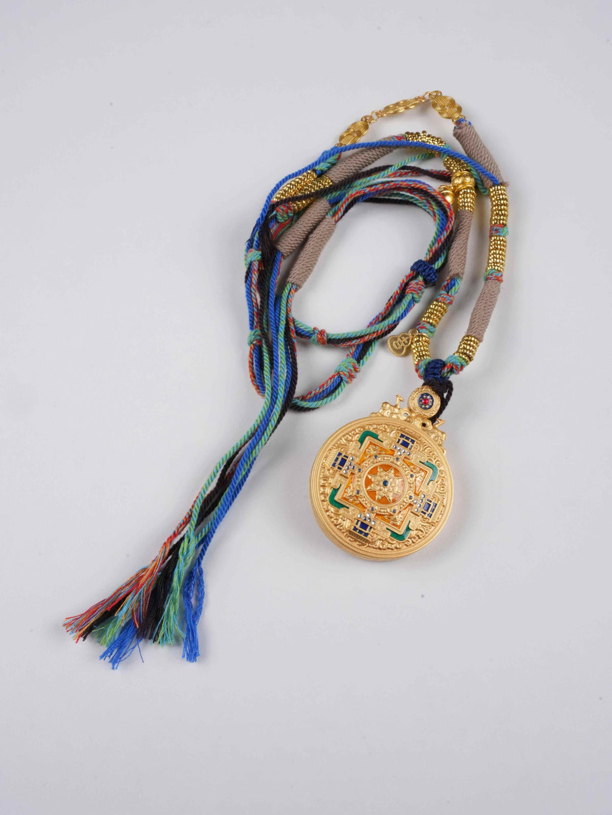 Traditional Tibetan Buddhist thangka painting of Om Mani Padme Hum mantra, hand-painted with natural mineral pigments on cotton canvas - sacred Tibetan Buddhist art
