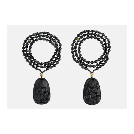 Handmade Tibetan-Buddhist obsidian necklace with copper beads symbolizing wealth and protection.