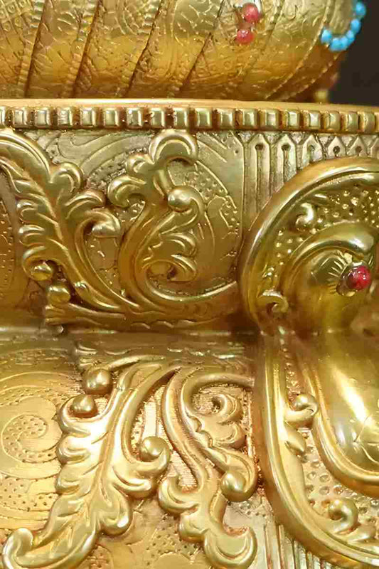 "Hand-painted Tibetan Buddhist Gautama Buddha brass statue with intricate detailing and mineral paints."