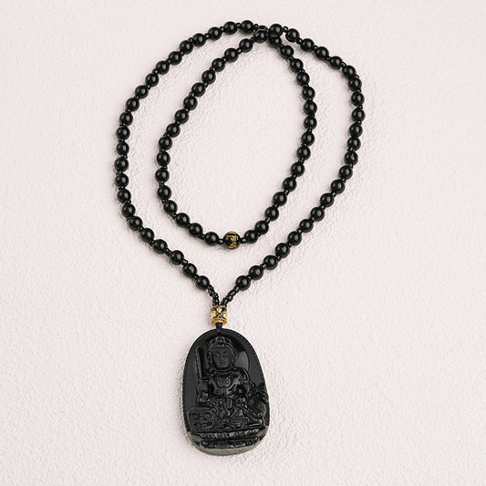 Black obsidian mantra necklace featuring the Six-Syllable Mantra for peace and spiritual strength.