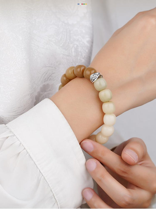 Tibetan-Buddhist Bodhi seed bracelet Qingye Zhufeng featuring handcrafted silver eight-facet bead and natural Bodhi texture.