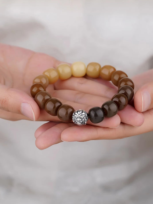 Tibetan Buddhist bodhi bracelet Rock Shadow Flow with handcrafted 12x11mm bodhi beads and 925 silver treasure mouse spacer