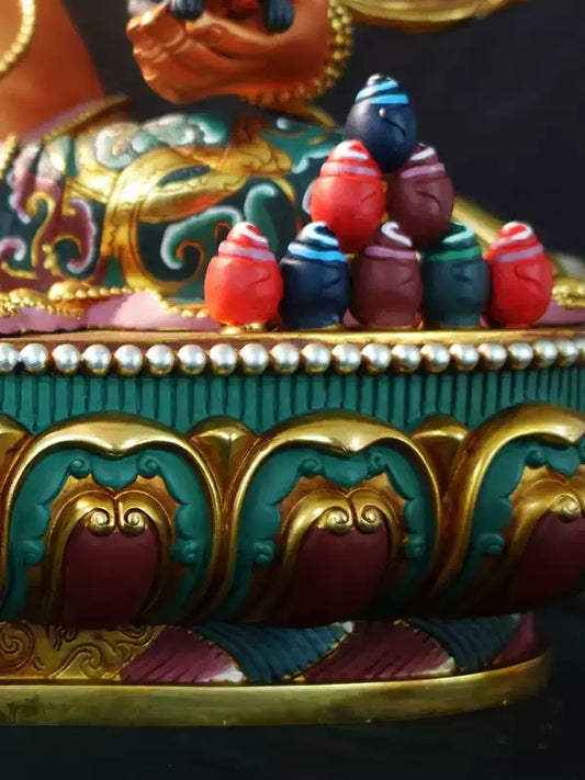 Hand-painted Tibetan Buddhist Yellow Jambhala statue made of brass and vibrant mineral pigments. A sacred piece of Buddha statue art for attracting wealth and abundance.